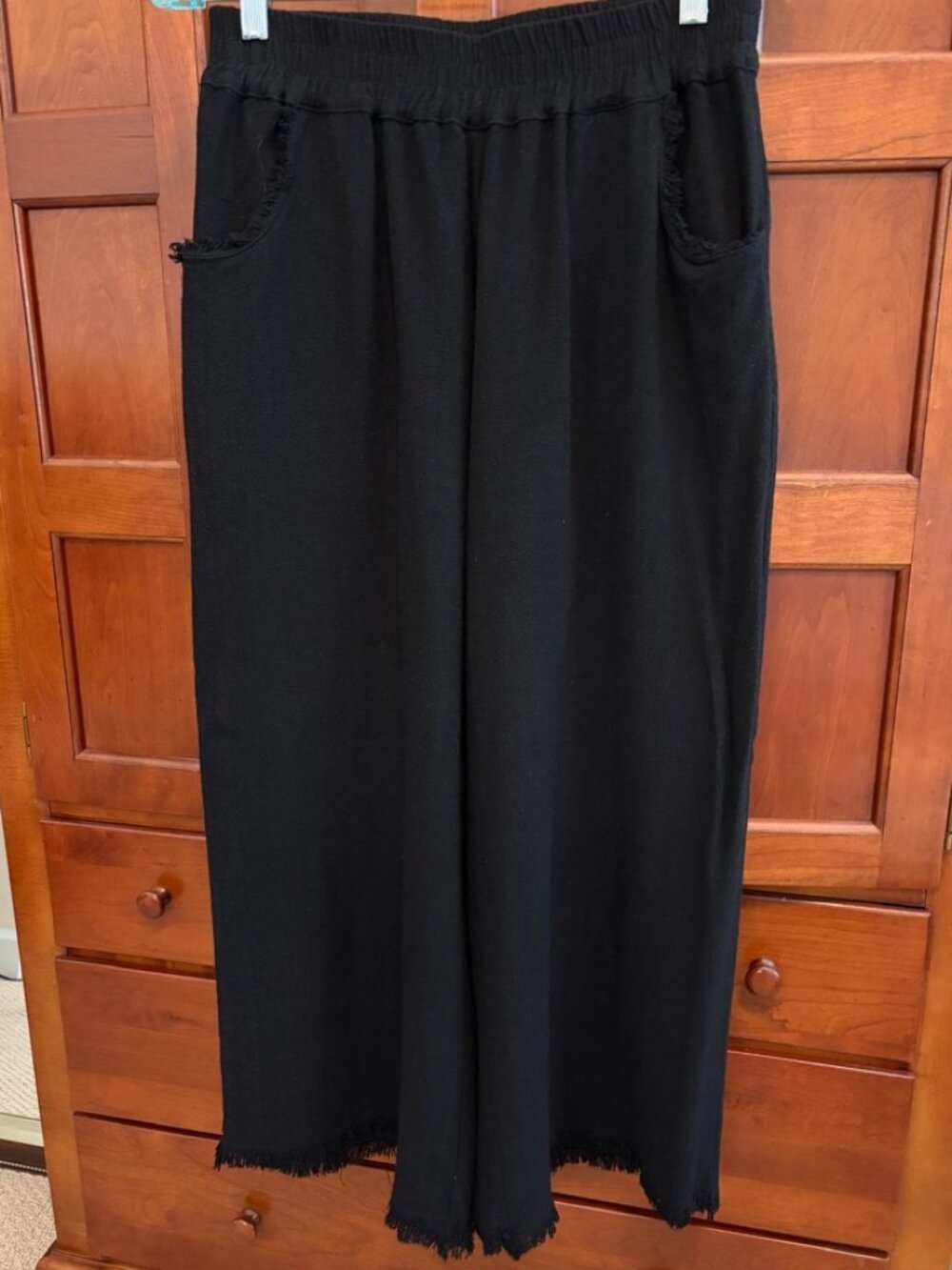 Black cropped pants by Umgee--Size Small--Frayed edges around hem and pockets